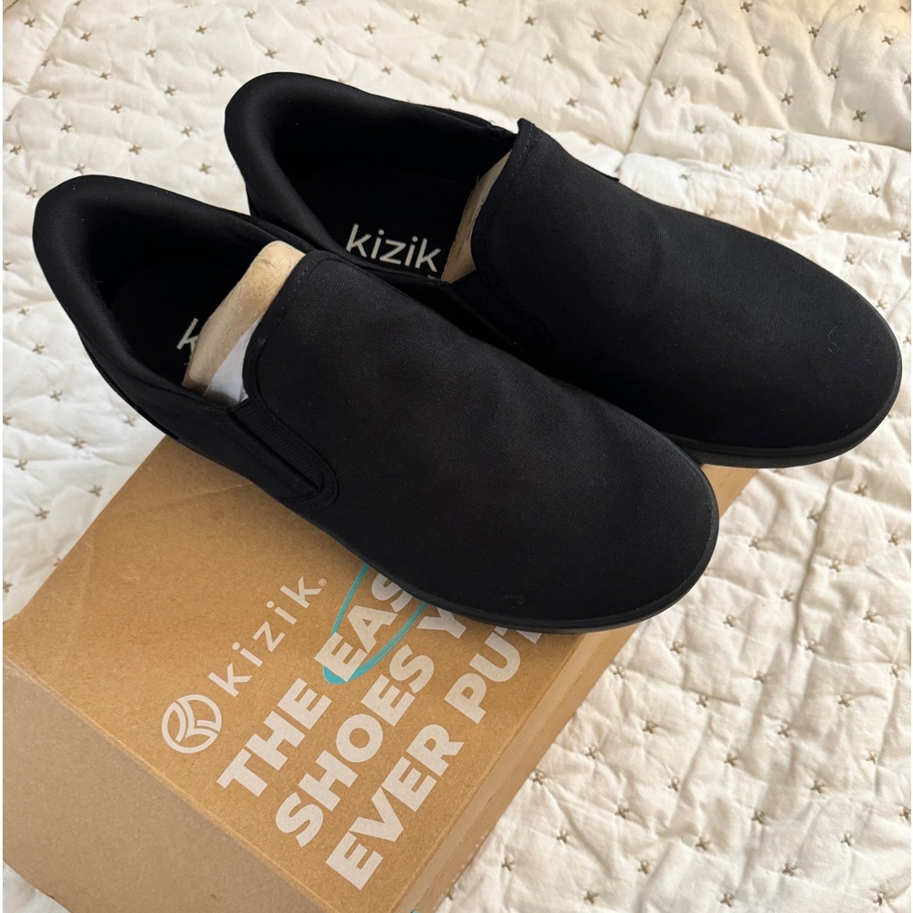 Kizik slip on new black sneakers. Men or women shoe. Size 10.5 men, 12 women.